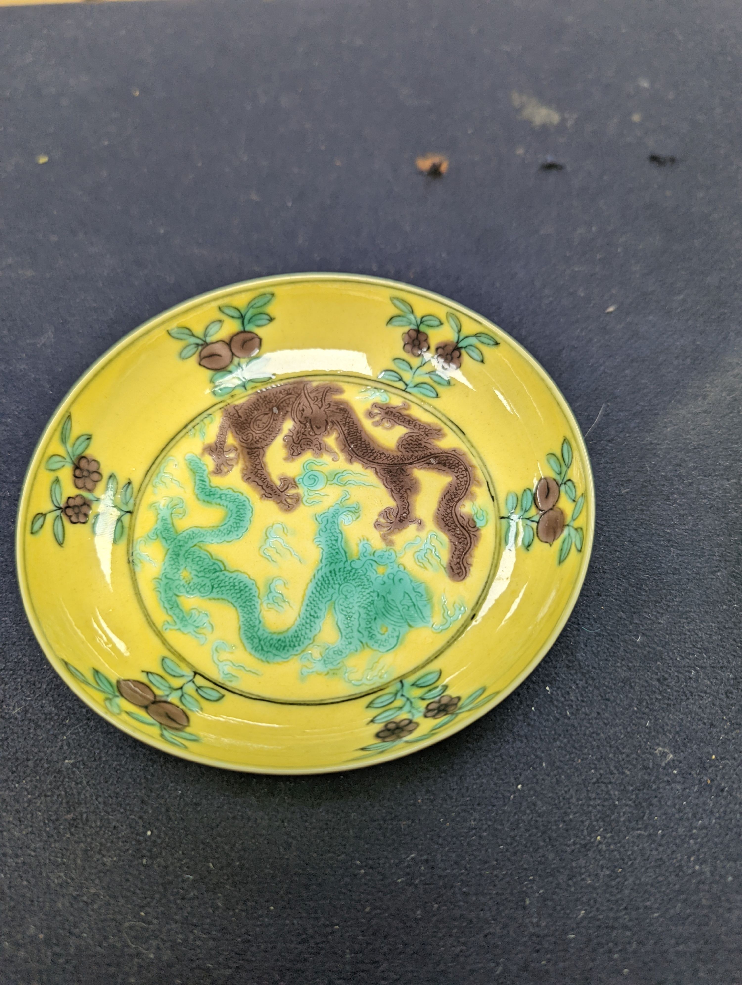 A pair of Chinese yellow, green and aubergine dragon dishes, Guangxu marks, 10cm.